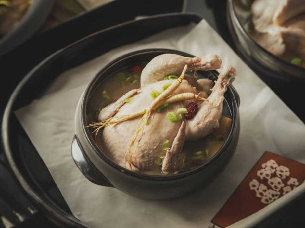 Serving Cock Soup in a bowl