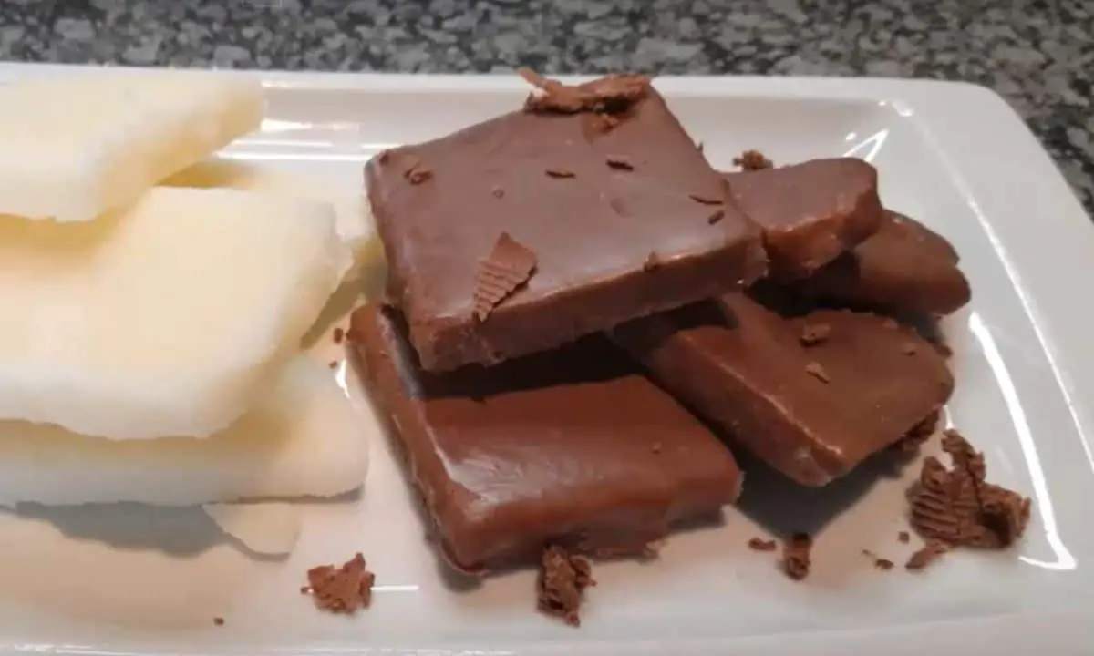Slices of Kendal Mint Cake on a wooden cutting board